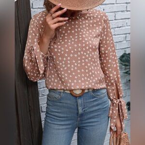 Pink floral blouse
